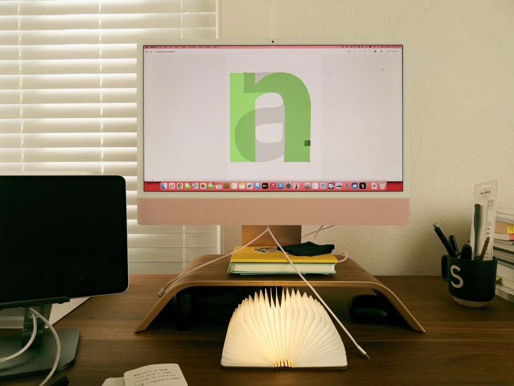 In-progress sketch of the letter a with the letter n in the backdrop